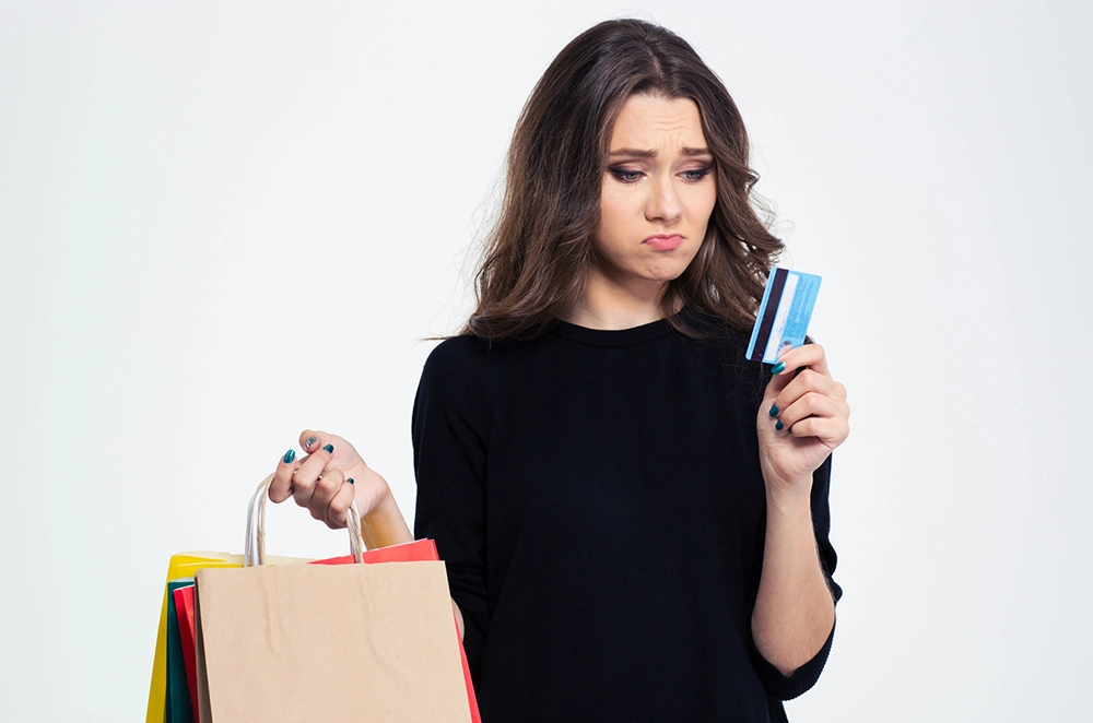 how to stop spending money you don't have